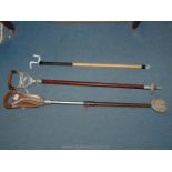 Two shooting sticks, one height adjustable, the other with fixed base and by Field,