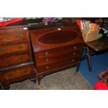 A 1930's/40's Mahogany Bureau, the slope front having patent action drawing forward,