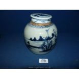 A collectable old oriental blue and white Ginger Jar illustrated with a scene with an island with