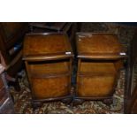 A pair of crossbanded burr Walnut and Mahogany Bedside Cabinets standing on carved detail brief