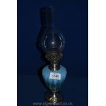 A Victorian vaseline glass oil Lamp, hallmarked silver base and lamp fitting, London 1888.