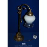 A brass table Lamp with ombre glass shade.