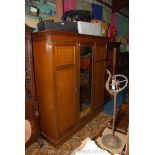 A good quality Edwardian crossbanded and light/dark wood strung Mahogany triple Wardrobe having to