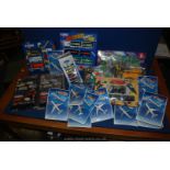 A box of boxed die cast and plastic Corgi sets including motorway etc.