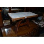 An arts and crafts type rectangular Occasional Table having pegged central stretcher,