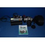 A Minolta AF-DL Camera and case, a photo sport and flash camera,