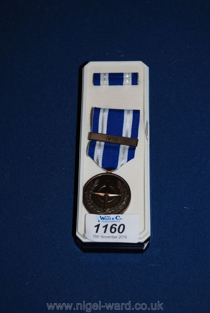 A boxed non-article 5 medal I.S.A.