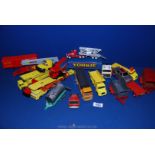 A quantity of toy lorries and transporter etc.