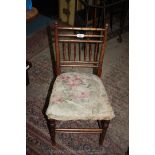 A child's Chair with floral seat