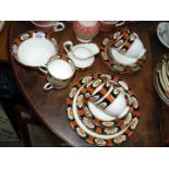 A twenty-one piece tea set, England Chelson.