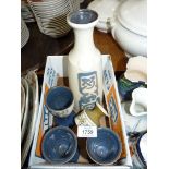 Four pieces of Laugharne Pottery made in Wales including three wine goblets and large wine server