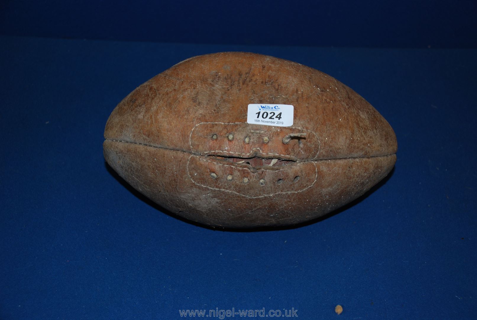 An old leather rugby ball a/f.