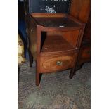 A Georgian Mahogany bow fronted tray-top Commode having fretworked side handle recesses,