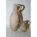 A small ancient Greco-Roman wine amphora (10 inches approx.