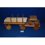 A wooden Lorry and timber trailer set.