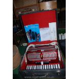 A Parrot Accordion, ninety-six base keys, cased.