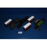 A black Airfix train and tender, green 8509 train and tender,