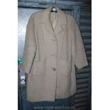 A pure lama wool coat, size 14-16.