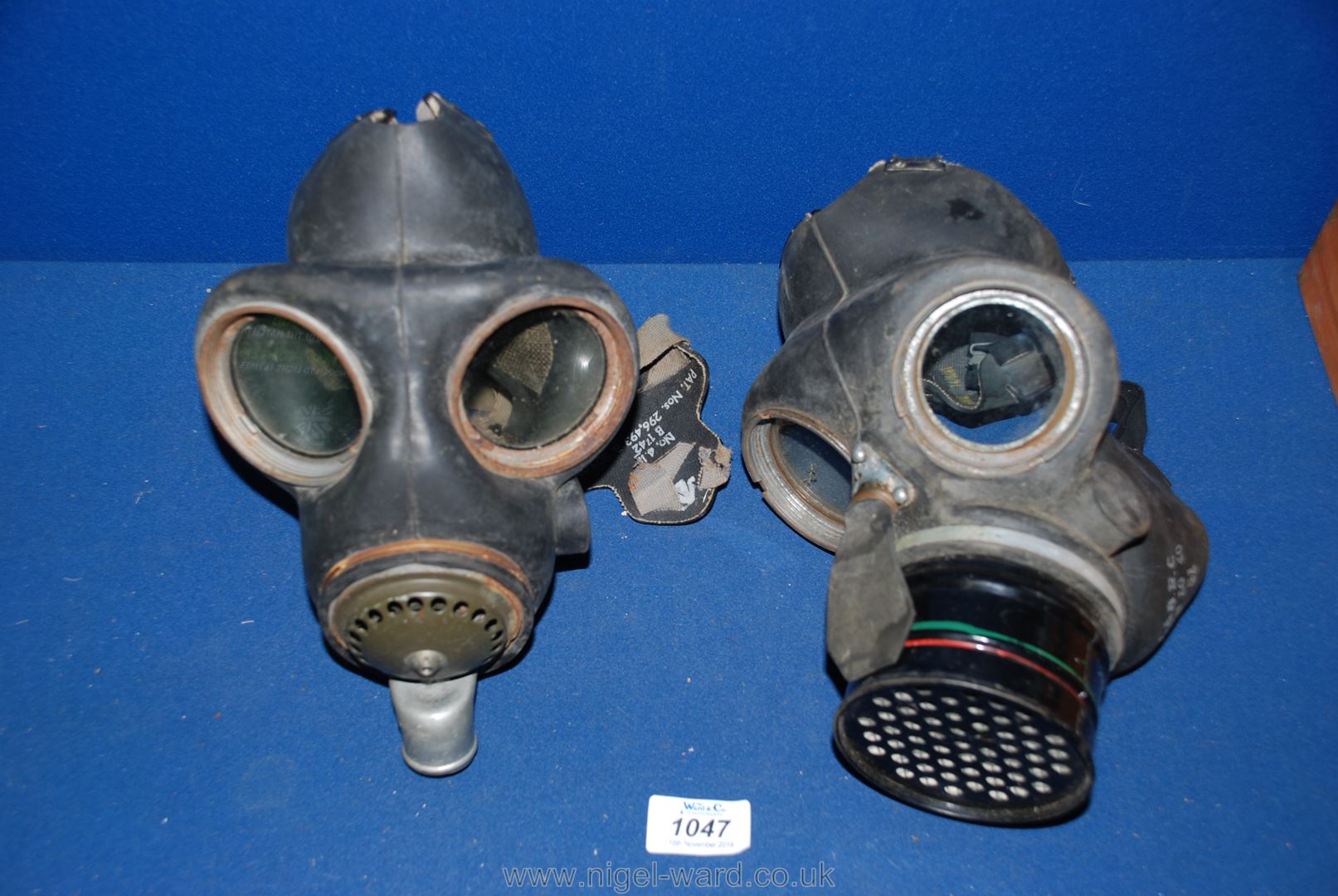 Two WWII rubber gas masks.