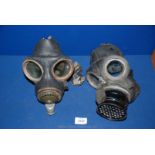 Two WWII rubber gas masks.