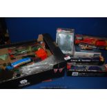A box of trains and tracks including Teamsters locomotive and tender, tank engine and carriage,