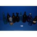 A quantity of glass chemist Bottles, etc.