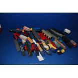 A large quantity of plastic carriages and rolling stock etc.