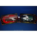 Two metal Solido boxed cars: Ford Publications 8010 and Bentley 8007.