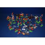 A quantity of plastic Cowboys and Indians, horses, army, etc.