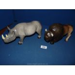 Two large Melbaware figures of a Rhinoceros and a Buffalo.