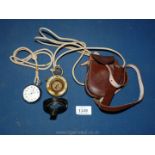 A leather cased military Marching Compass with neck lanyard, marked ''Patents 29677/10, 14983/13,