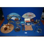 A quantity of miscellanea including treen elephant and napkin rings, brass bell and dog, harmonica,