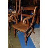 An Oxford bar back kitchen Carver Chair having solid seat,