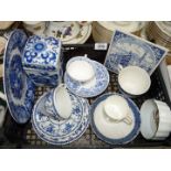 A quantity of blue and white china including Minton, Burleighware, etc.