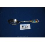 A sterling silver Spoon with Canadian enamel coat of arms and maple leaf, the bowl stamped Hamilton.