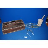 A cutlery box with metal handle, wooden pestle and mortar,