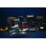 A quantity of scale model 1:43 cased cars including Austin Healey 100, Fiat 500, Bugatti Royale etc.