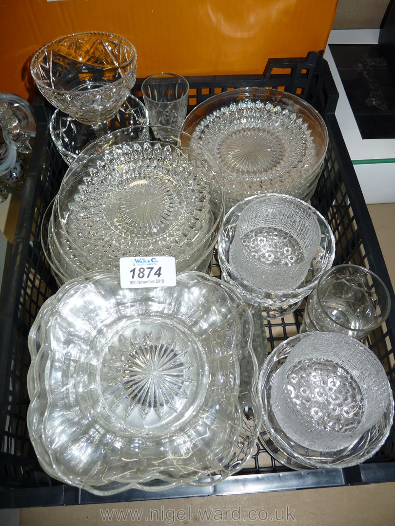 A quantity of glass saucers, three sundae dishes, a champagne glass etc.