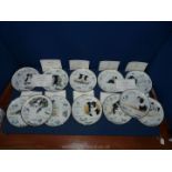 A set of twelve Danbury Mint Border Collie year Plates by Paul Doyle.