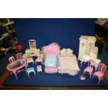 A box of Sindy and Barbie Bedroomware including two beds, bed dressings table and chairs, etc.