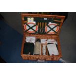A Picnic Hamper complete with cutlery and plates.