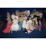 A box of Sindy and Barbie Dolls including Ken's, some a/f.