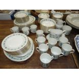 A twelve place Dinner service by Royal Doulton in 'tapestry' pattern including;