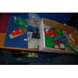 A quantity of Lego including Lego characters and Playmobile characters.
