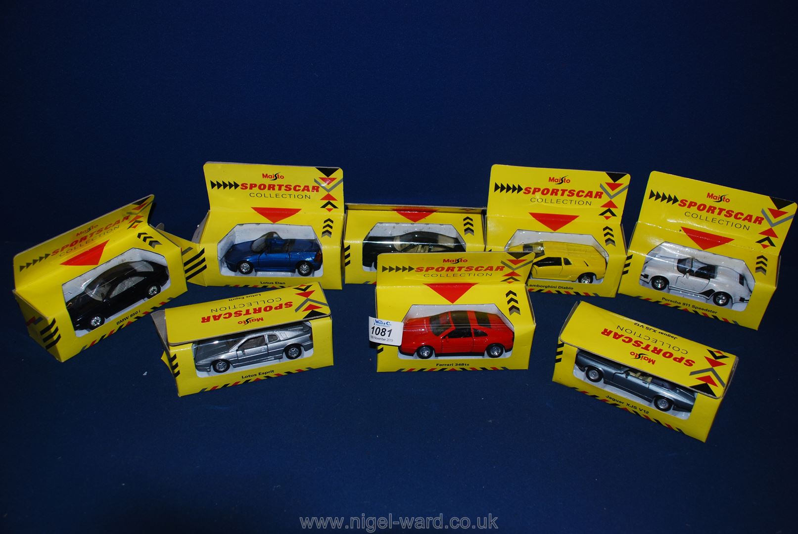 Three Maisto model sports cars including Porsche 911 Speedster, Jaguar VJSVIZ, Ferrari 348 etc.