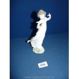 A Lladro figure Nos. 6947, 'young lady in nightdress'.