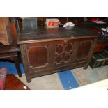 A heavy dark Oak Coffer/Blanket Chest of Jacobean design having moulded perimeters to the three