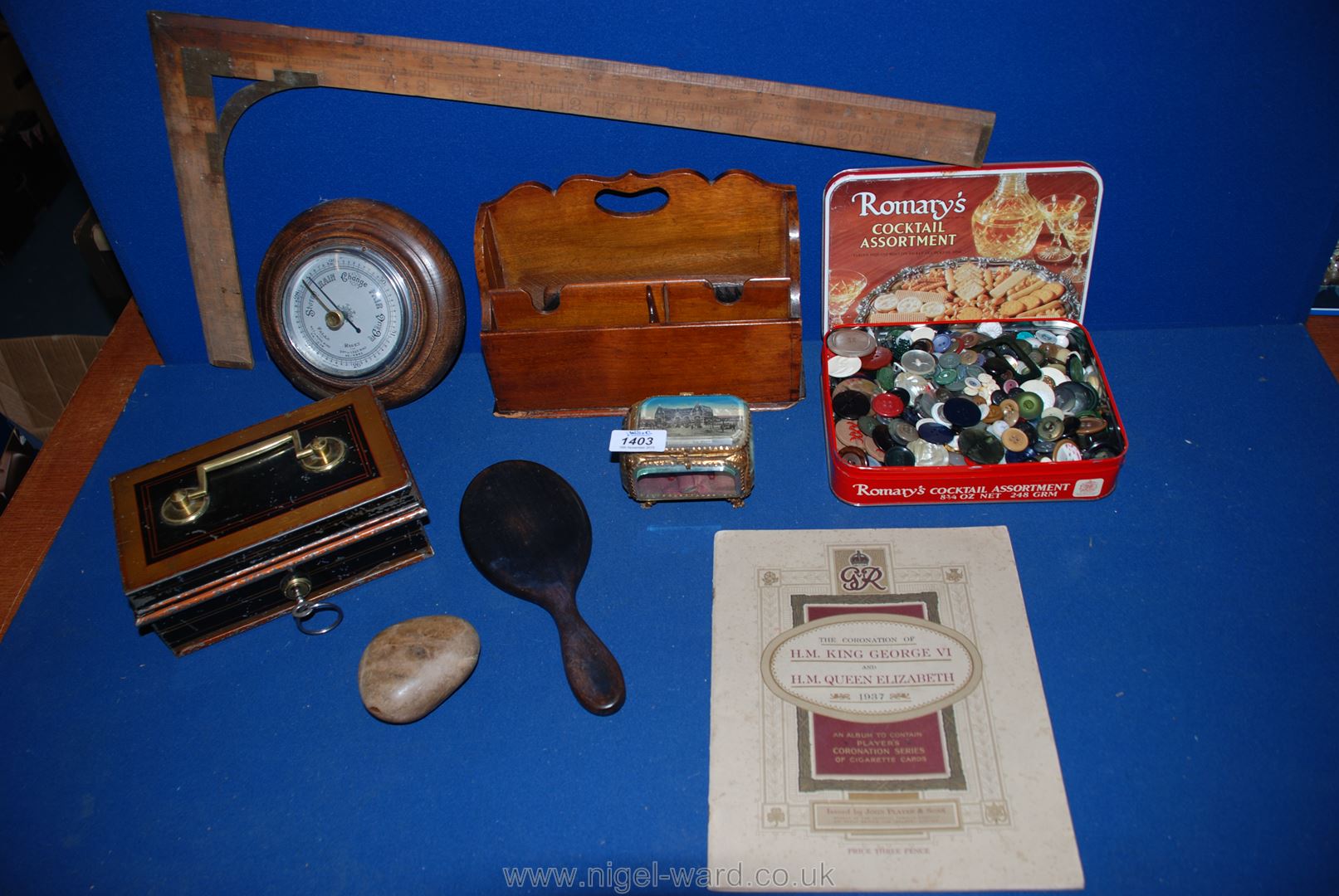 A wooden letter rack, box of mixed buttons, old cash tin complete with insert and key,