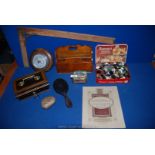 A wooden letter rack, box of mixed buttons, old cash tin complete with insert and key,