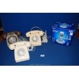 Three vintage Telephones and one digital